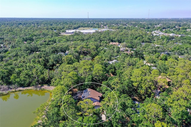 4917 Leatha Ln, Sarasota, FL 34232 - aerial view of a forest and a nearby body of water