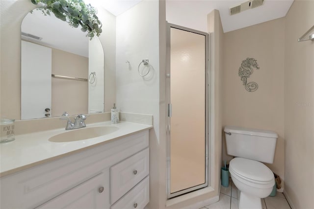 4650 Ringwood Mdw Unit 37, Sarasota, FL 34235 - bathroom featuring a stall shower, tile patterned floors, toilet, and vanity
