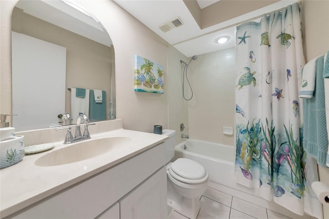 4650 Ringwood Mdw Unit 37, Sarasota, FL 34235 - bathroom featuring shower / tub combo, toilet, tile patterned flooring, and vanity