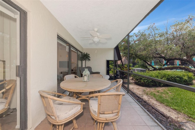 4650 Ringwood Mdw Unit 37, Sarasota, FL 34235 - view of patio featuring a ceiling fan and outdoor dining space