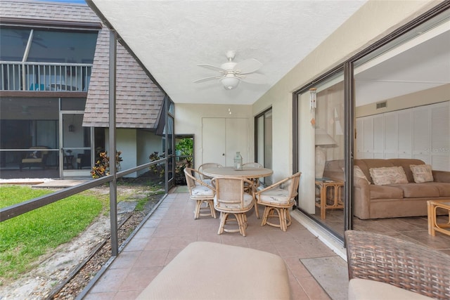 4650 Ringwood Mdw Unit 37, Sarasota, FL 34235 - sunroom / solarium featuring a ceiling fan