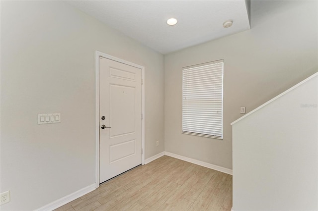 5420 River Sound Ter, Bradenton, FL 34208 - foyer entrance featuring light wood-type flooring and baseboards