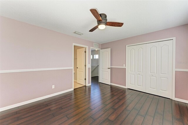 5420 River Sound Ter, Bradenton, FL 34208 - unfurnished bedroom featuring wood finished floors, baseboards, a closet, and a ceiling fan