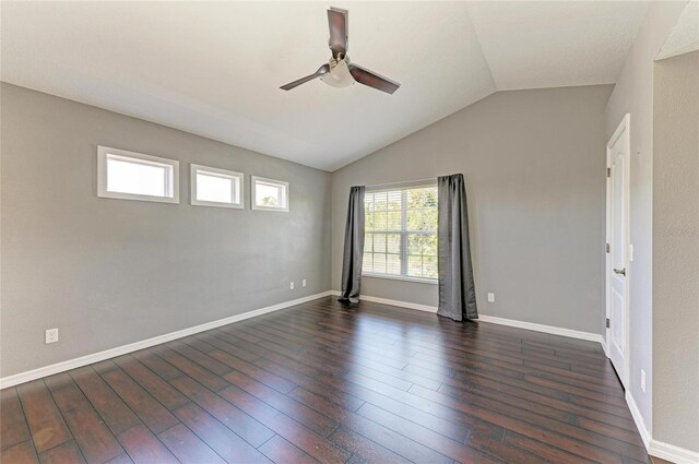 5420 River Sound Ter, Bradenton, FL 34208 - unfurnished room with ceiling fan, dark wood-style floors, lofted ceiling, and baseboards
