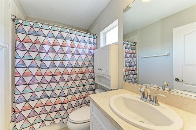 5420 River Sound Ter, Bradenton, FL 34208 - full bathroom with vanity, toilet, and a shower with curtain