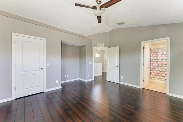 5420 River Sound Ter, Bradenton, FL 34208 - unfurnished bedroom with vaulted ceiling, wood finished floors, baseboards, ensuite bathroom, and ceiling fan