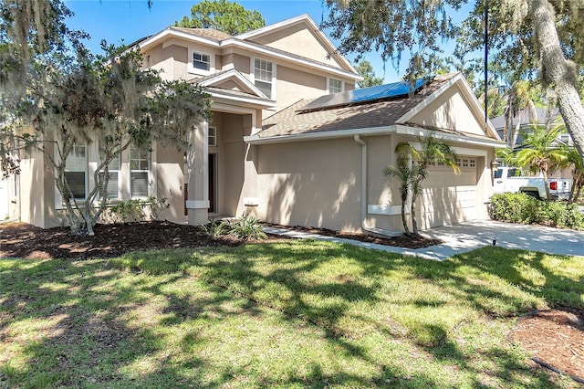 6032 36th Ct E, Ellenton, FL 34222 - view of front facade with stucco siding, a garage, roof mounted solar panels, and a front lawn