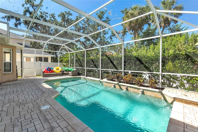 6032 36th Ct E, Ellenton, FL 34222 - swimming pool featuring a patio area and glass enclosure