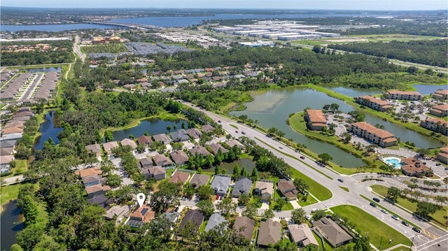 6032 36th Ct E, Ellenton, FL 34222 - aerial view of property and surrounding area featuring a large body of water and nearby suburban area