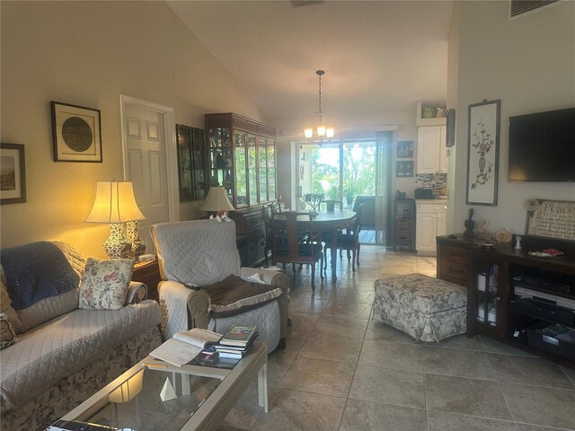 4027 Allure Ln, North Port, FL 34287 - living area with a chandelier and high vaulted ceiling