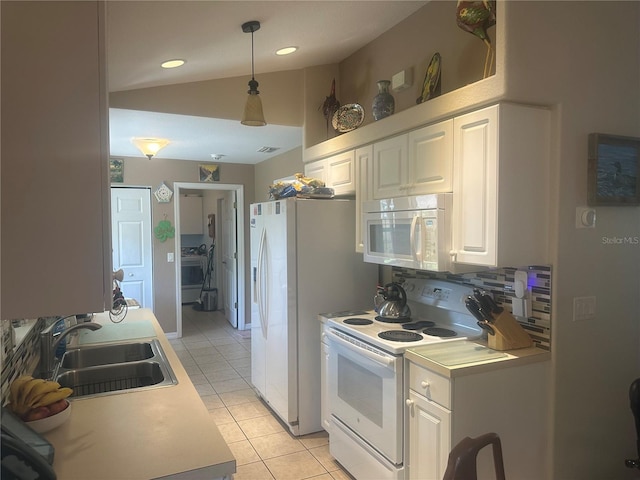 4027 Allure Ln, North Port, FL 34287 - kitchen featuring white appliances, a sink, light tile patterned flooring, white cabinets, and light countertops