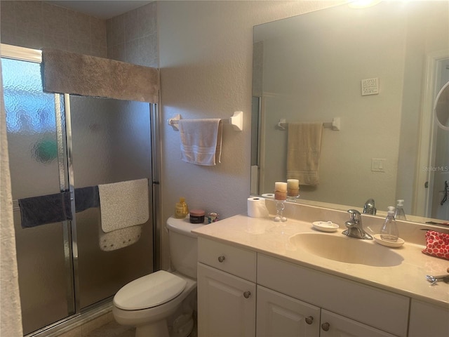 4027 Allure Ln, North Port, FL 34287 - bathroom with vanity, a stall shower, and toilet