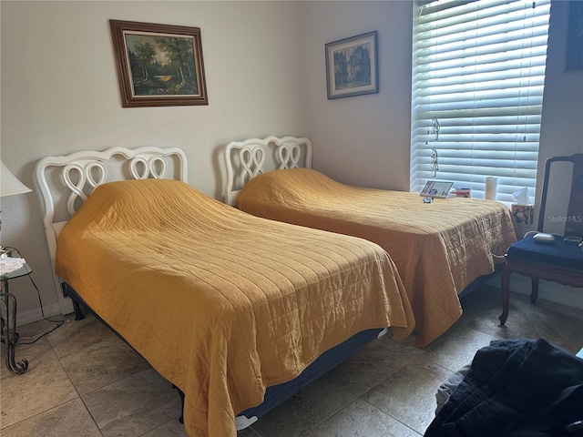 4027 Allure Ln, North Port, FL 34287 - bedroom with stone tile flooring
