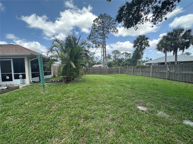 4027 Allure Ln, North Port, FL 34287 - fenced backyard with a sunroom