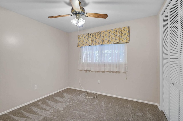 149 Small St SE, Port Charlotte, FL 33952 - unfurnished bedroom featuring carpet flooring, a closet, baseboards, a ceiling fan, and a heating unit