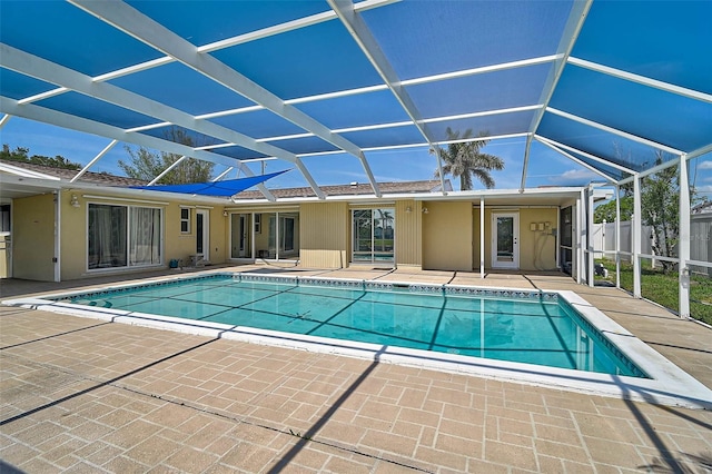 149 Small St SE, Port Charlotte, FL 33952 - swimming pool with a patio area and glass enclosure