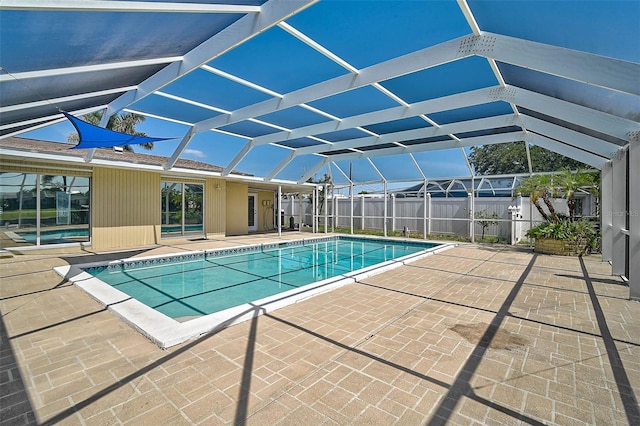 149 Small St SE, Port Charlotte, FL 33952 - view of pool featuring a patio area and glass enclosure