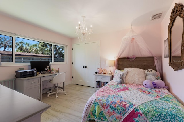 5581 Shadow Lawn Dr, Sarasota, FL 34242 - bedroom featuring a chandelier and a desk
