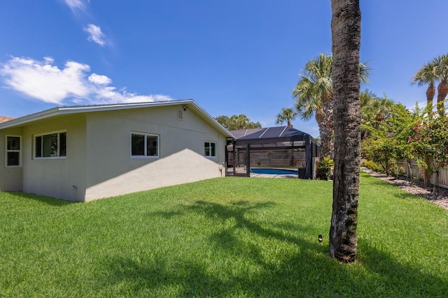 5581 Shadow Lawn Dr, Sarasota, FL 34242 - view of yard featuring a lanai