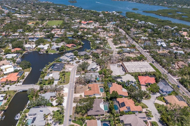 5581 Shadow Lawn Dr, Sarasota, FL 34242 - aerial view of property and surrounding area featuring a nearby body of water and nearby suburban area