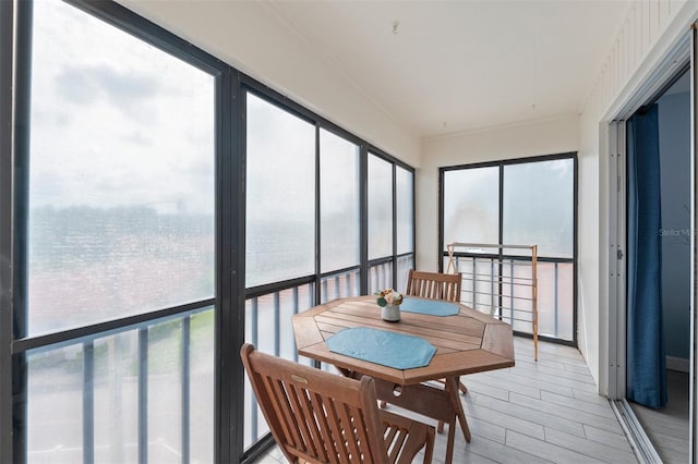 110 Vista Hermosa Cir Unit 302B, Sarasota, FL 34242 - sunroom / solarium featuring wood finished floors