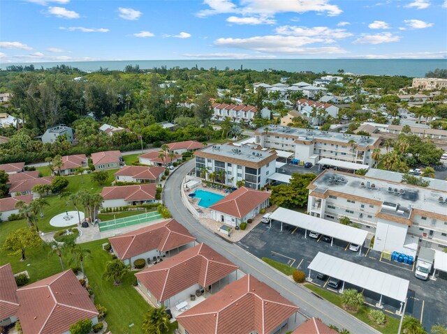 110 Vista Hermosa Cir Unit 302B, Sarasota, FL 34242 - bird's eye view of a pool and a large body of water