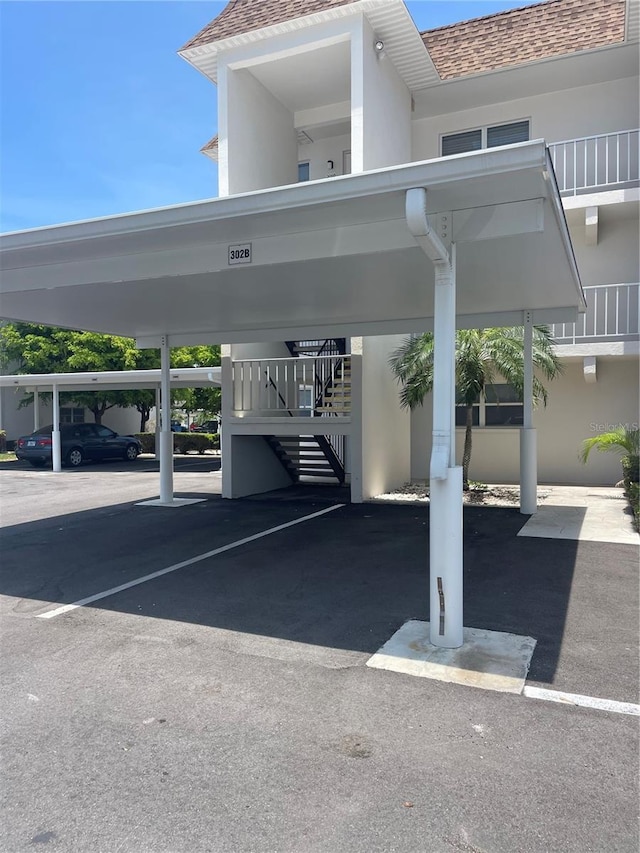 110 Vista Hermosa Cir Unit 302B, Sarasota, FL 34242 - view of covered parking lot