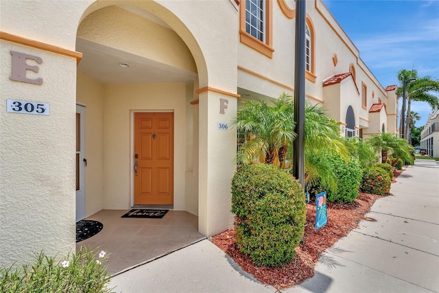 1216 Rio De Janeiro Ave Unit 306, Punta Gorda, FL 33983 - entrance to property featuring stucco siding