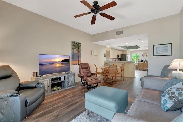 1216 Rio De Janeiro Ave Unit 306, Punta Gorda, FL 33983 - living area with wood finished floors and a ceiling fan