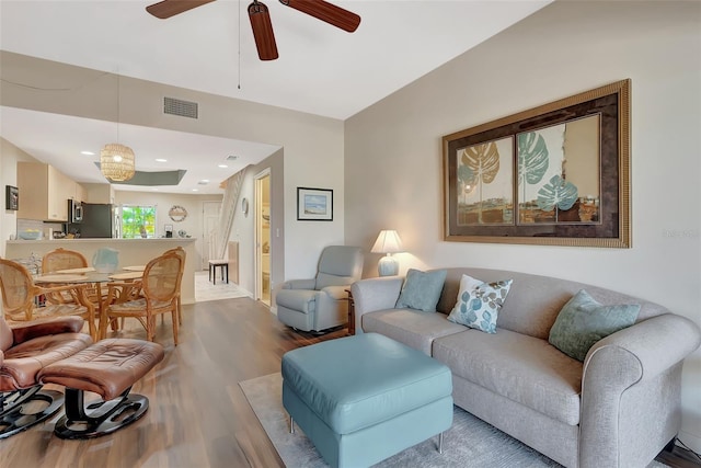 1216 Rio De Janeiro Ave Unit 306, Punta Gorda, FL 33983 - living room featuring wood finished floors and ceiling fan