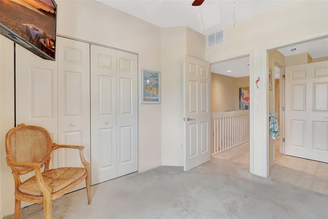 1216 Rio De Janeiro Ave Unit 306, Punta Gorda, FL 33983 - living area featuring light carpet and ceiling fan