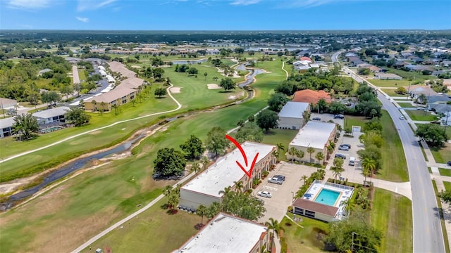 1216 Rio De Janeiro Ave Unit 306, Punta Gorda, FL 33983 - aerial view of property's location with a golf club, a nearby body of water, and nearby suburban area