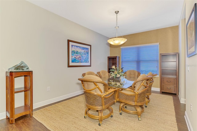 12229 Stuart Dr, Venice, FL 34293 - dining space with wood finished floors and baseboards