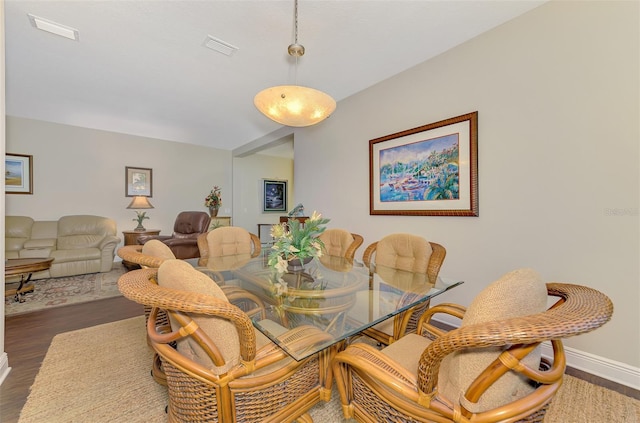 12229 Stuart Dr, Venice, FL 34293 - dining room with wood finished floors and baseboards