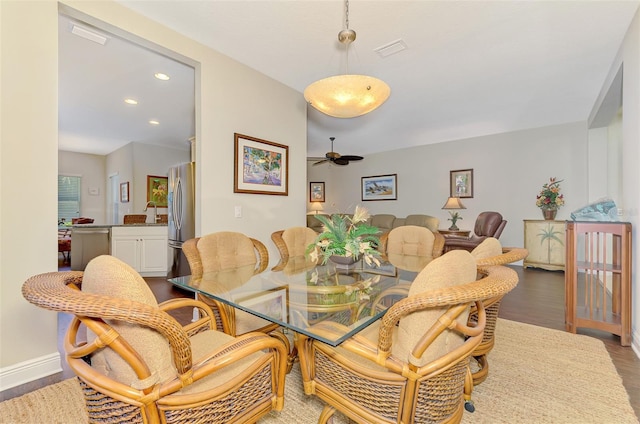 12229 Stuart Dr, Venice, FL 34293 - dining room featuring ceiling fan, wood finished floors, recessed lighting, and baseboards