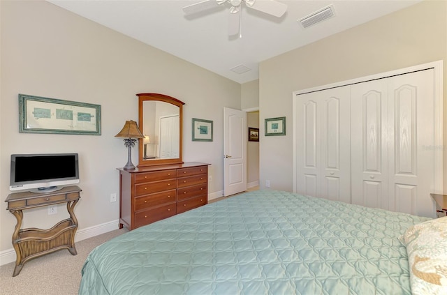 12229 Stuart Dr, Venice, FL 34293 - carpeted bedroom featuring a closet, baseboards, and a ceiling fan