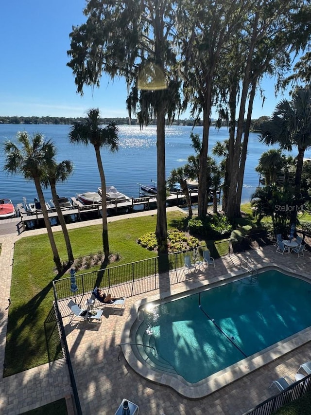 690 Osceola Ave Unit 405, Winter Park, FL 32789 - view of swimming pool with a water view and a patio