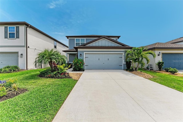 8940 Royal River Cir, Parrish, FL 34219 - view of front of home with a front lawn, concrete driveway, and a garage