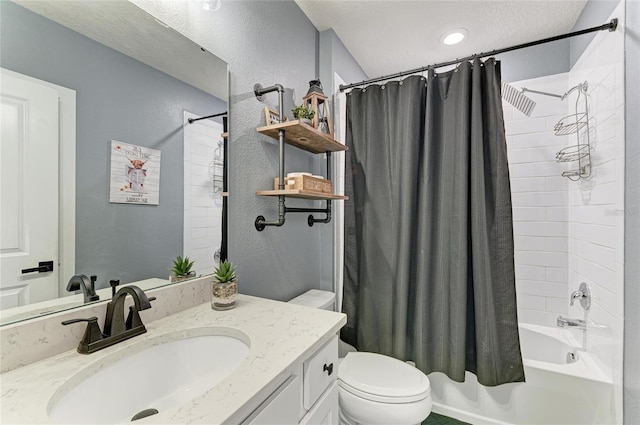 8940 Royal River Cir, Parrish, FL 34219 - bathroom featuring vanity, shower / bath combination with curtain, toilet, a textured wall, and a textured ceiling