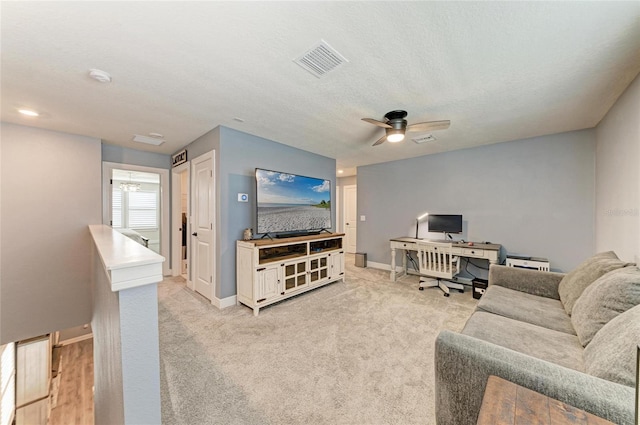 8940 Royal River Cir, Parrish, FL 34219 - living area featuring an office area, ceiling fan, and baseboards
