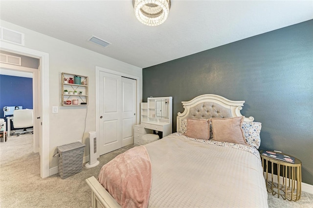 8940 Royal River Cir, Parrish, FL 34219 - carpeted bedroom featuring an office area, baseboards, and a closet