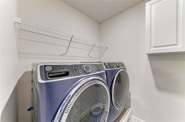 8940 Royal River Cir, Parrish, FL 34219 - washroom featuring independent washer and dryer and cabinet space