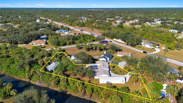 31 Twig Ct, Port Charlotte, FL 33954 - aerial overview of property's location with property parcel outlined and a nearby body of water