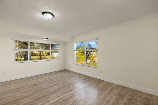 31 Twig Ct, Port Charlotte, FL 33954 - empty room with crown molding, wood finished floors, baseboards, and a textured ceiling