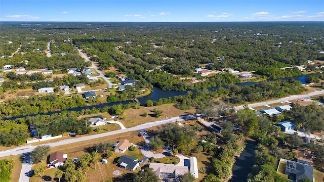31 Twig Ct, Port Charlotte, FL 33954 - view of property location featuring a large body of water, nearby suburban area, and a heavily wooded area