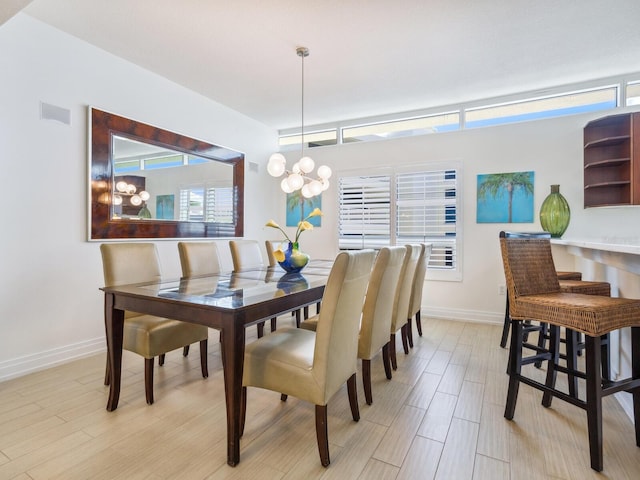 6512 Midnight Pass Rd Unit 301, Sarasota, FL 34242 - dining space featuring light wood-type flooring and baseboards