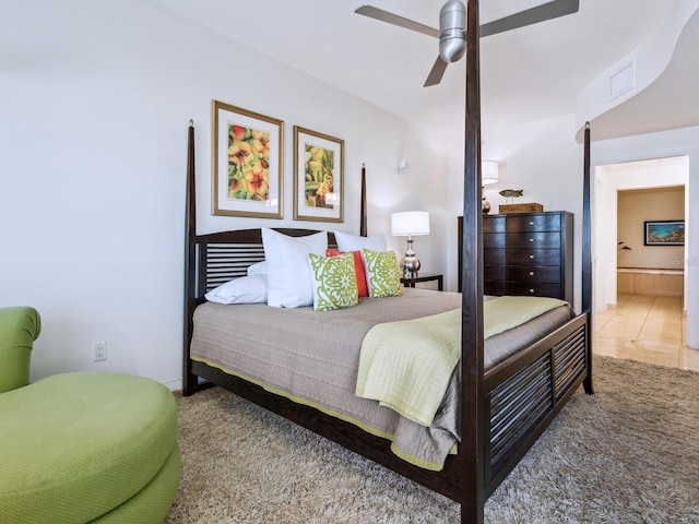 6512 Midnight Pass Rd Unit 301, Sarasota, FL 34242 - bedroom with ensuite bath, ceiling fan, and carpet floors