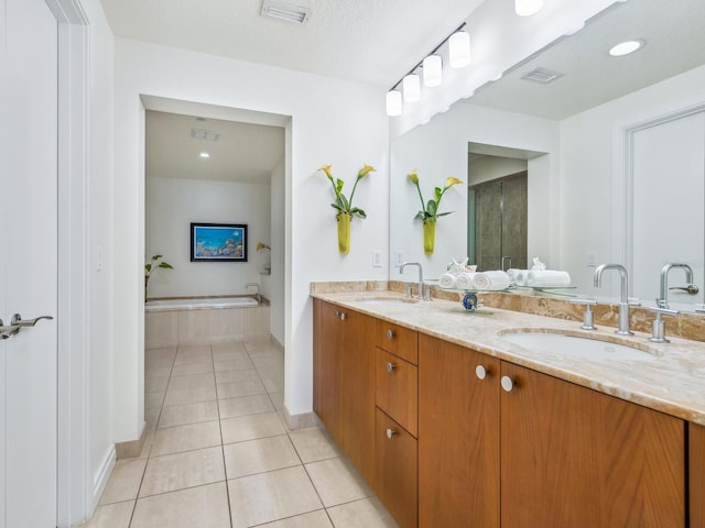 6512 Midnight Pass Rd Unit 301, Sarasota, FL 34242 - full bathroom featuring tile patterned flooring, double vanity, and a bath