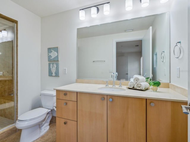 6512 Midnight Pass Rd Unit 301, Sarasota, FL 34242 - bathroom featuring toilet, vanity, tile patterned flooring, and a stall shower