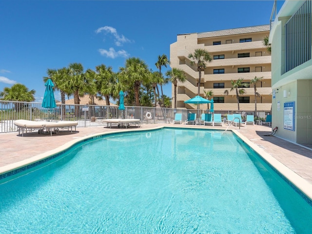 6512 Midnight Pass Rd Unit 301, Sarasota, FL 34242 - community pool featuring a patio area